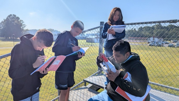 Students working outside 