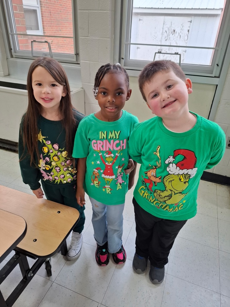 students in Grinch gear