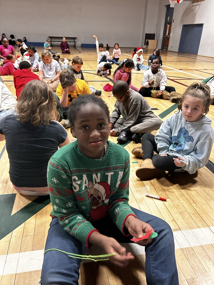 student at house meeting