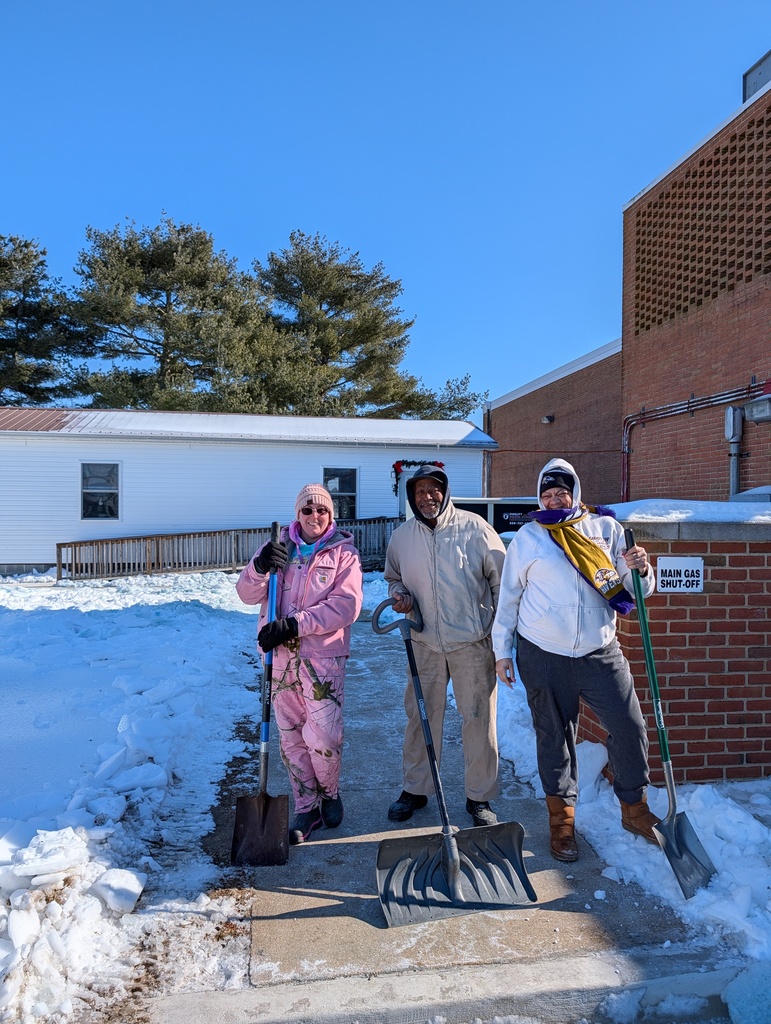 Custodians holding shovels