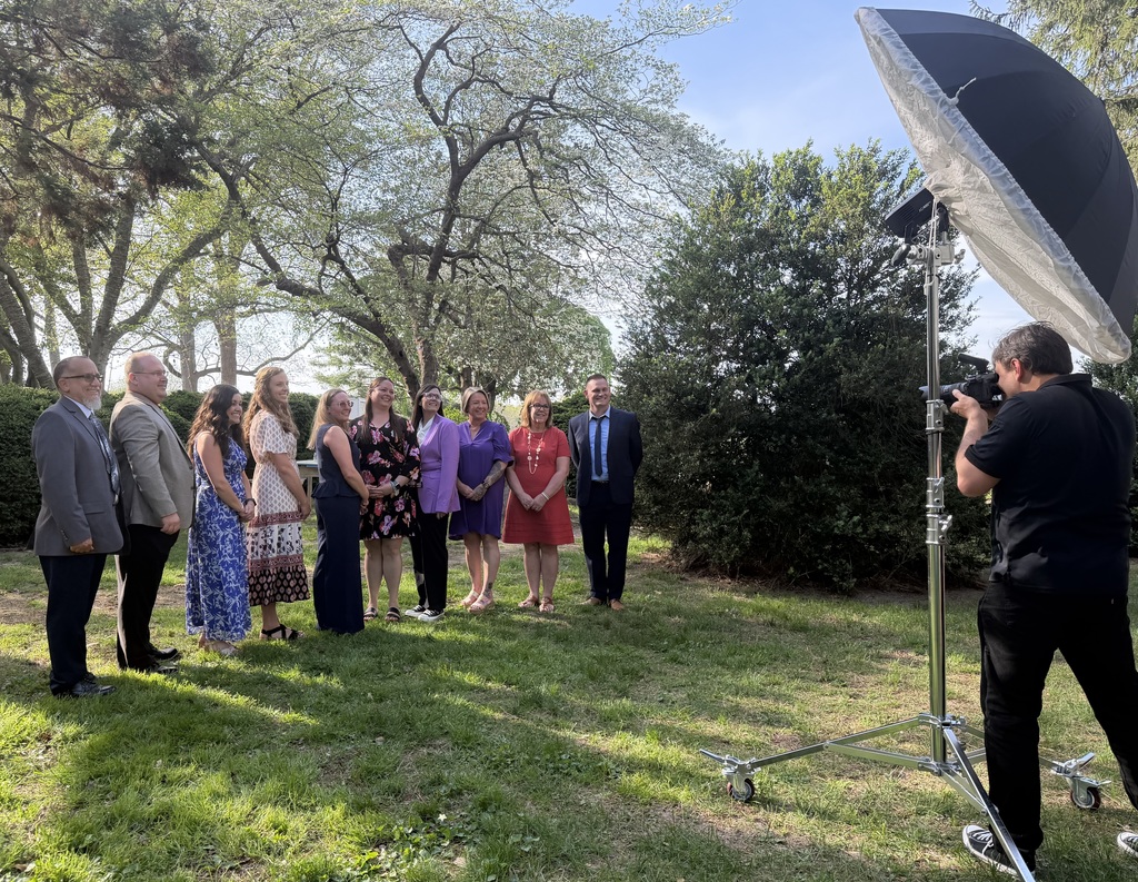 finalists posing for photographer
