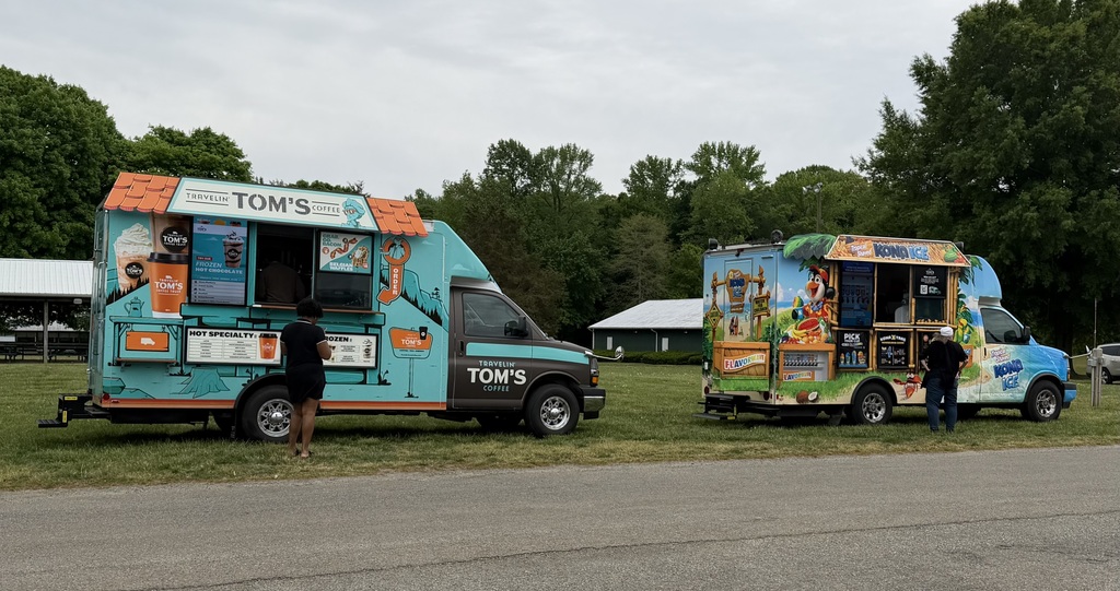two vans at curbside
