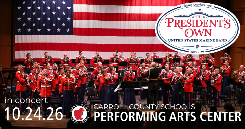 a large military band in red uniforms plays in front of a larger american flag. logo for the president's own US marine band in concert 10.24.26