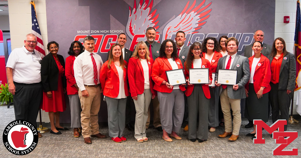 Mount Zion high school officials, district leaders pose for a photo with their national stem certification from nise