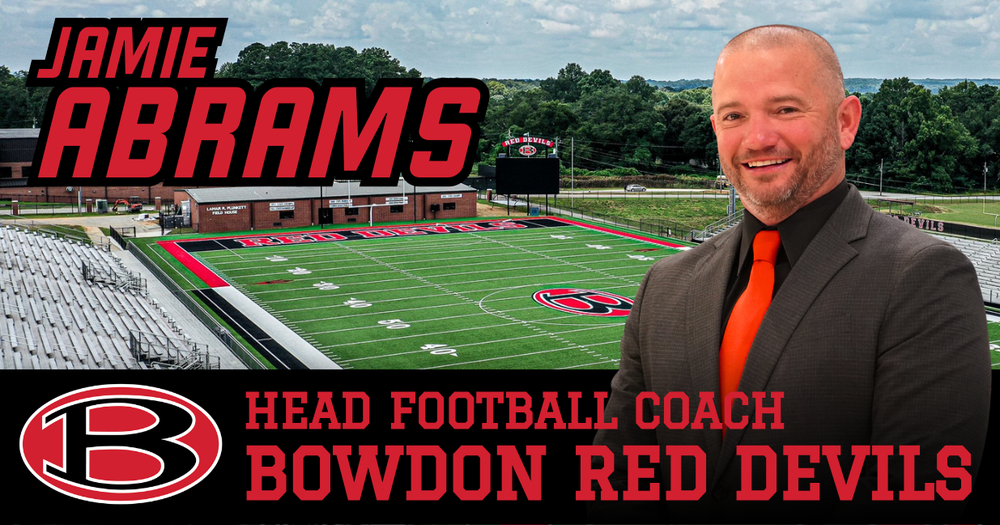 jamie abrams head football coach bowdon red devils. image of abrams in front of Dwight Hochstetler Stadium