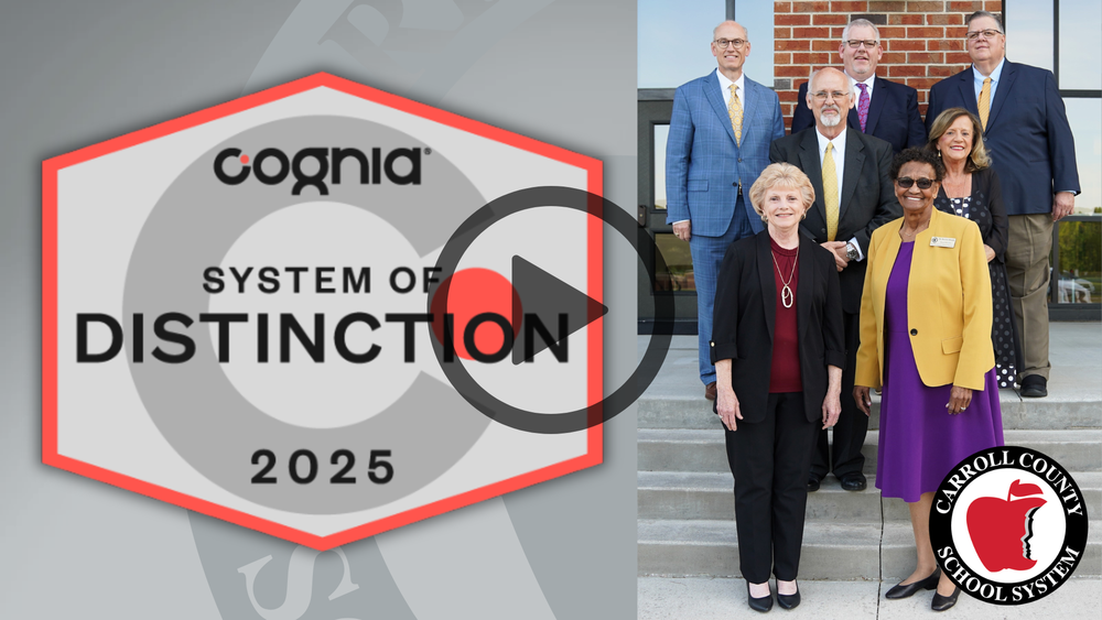 Cognia system of distinction logo flanks the members of the carroll county board of education