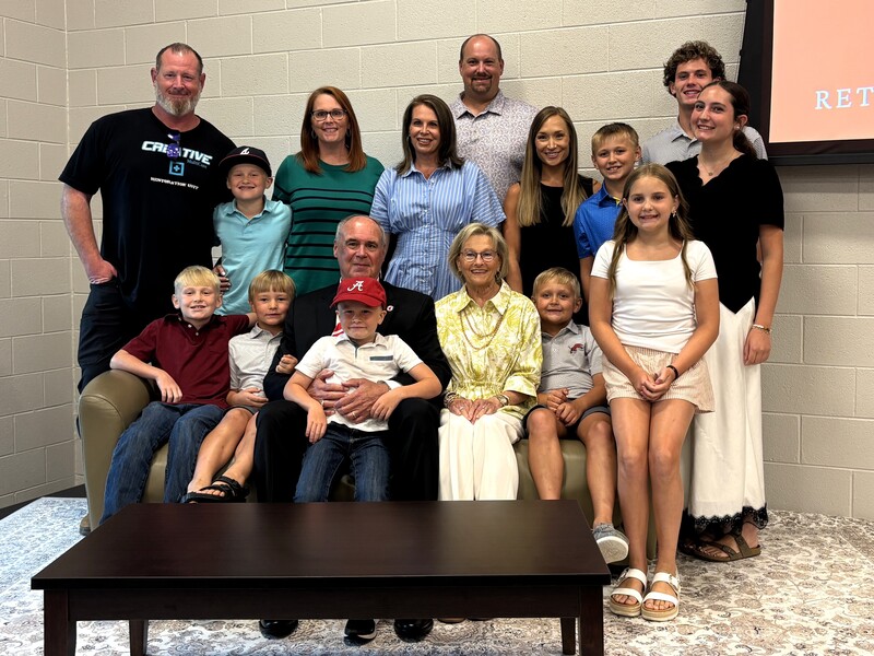 Cowart and his family gather for a photo after the program