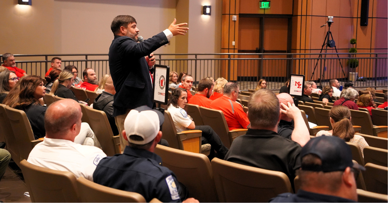 tim gribben speaks from the audience at the safety summit