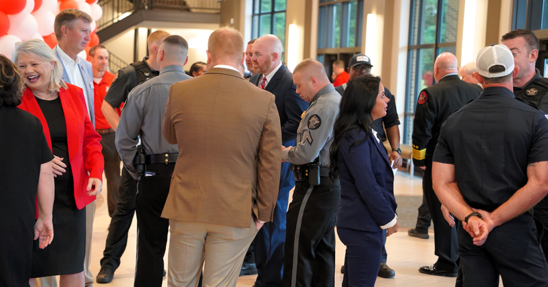 a crowd gathers in the lobby