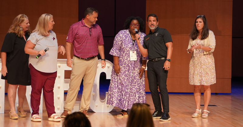 people on stage at the PAC