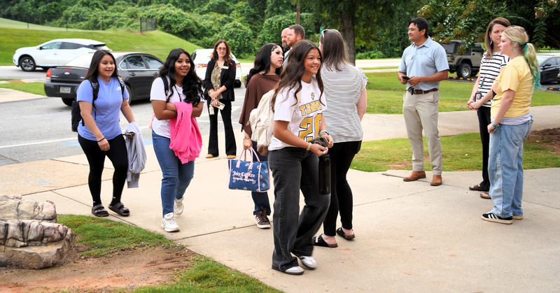 THS students are greeted by community members at their annual Invest 30 event.