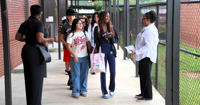 THS students are greeted by community members at their annual Invest 30 event.