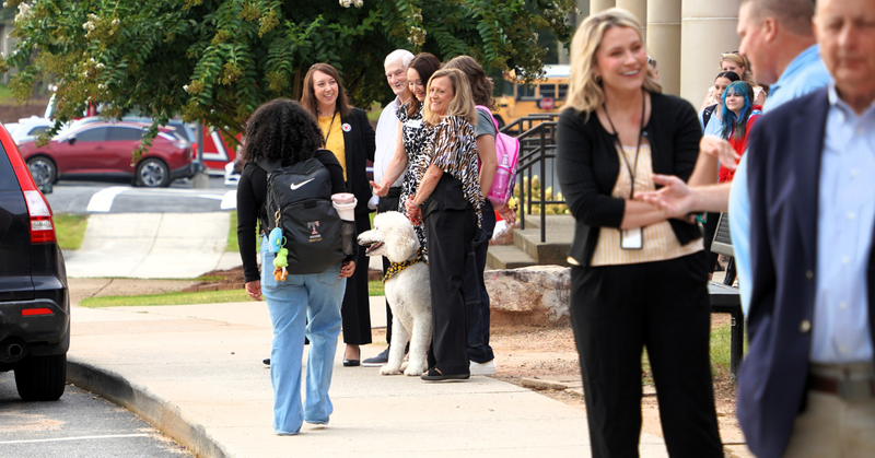 THS students are greeted by community members at their annual Invest 30 event.