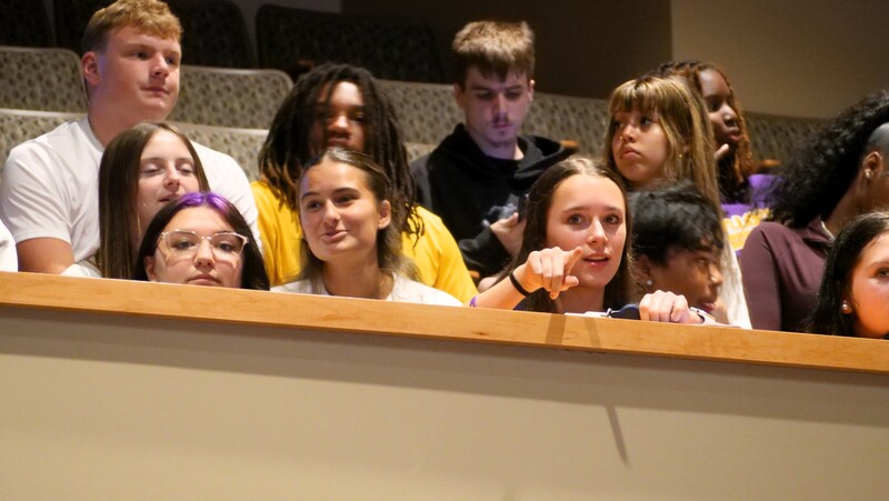 a crowd of high school seniors at the performing arts center