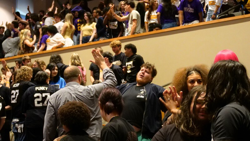 a crowd of high school seniors at the performing arts center