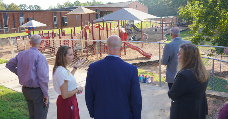 principal turpin shows off the pre-k playground