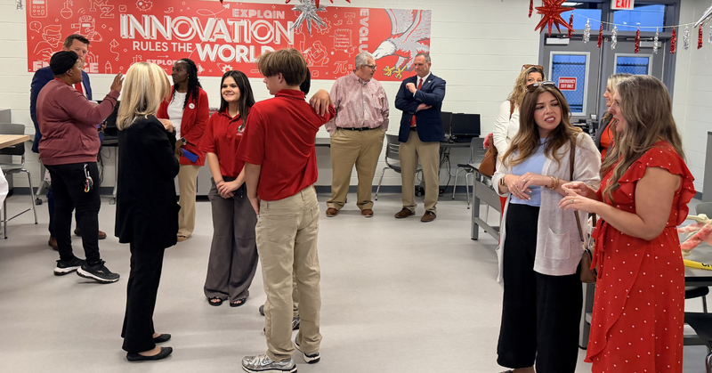 students talk with community partners in the new STEM lab at MZMS