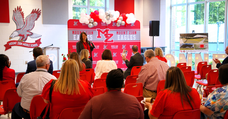 Superintendent Ainsworth addresses guests at the Mount Zion cluster community connection event