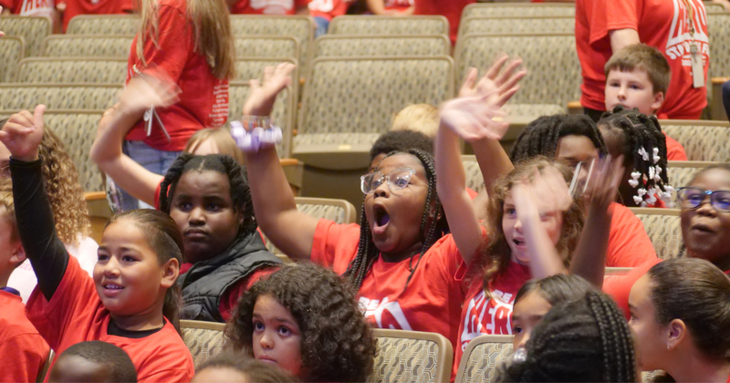 students cheer at the drug rally