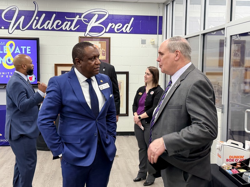 superintendent scott cowart talks with city councilman tyler barr
