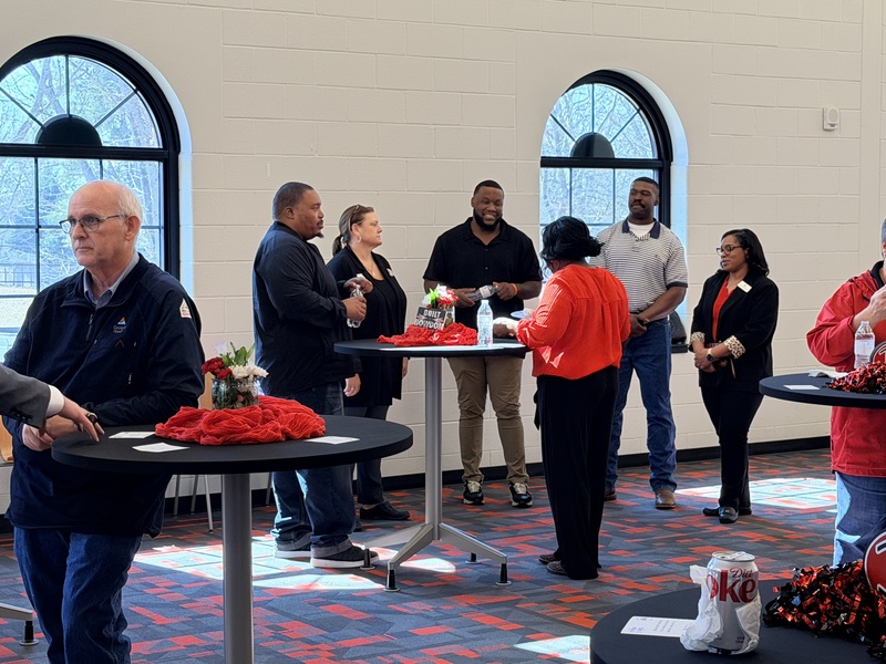 Bowdon community partners gather at the BHS media center for a partnership celebration