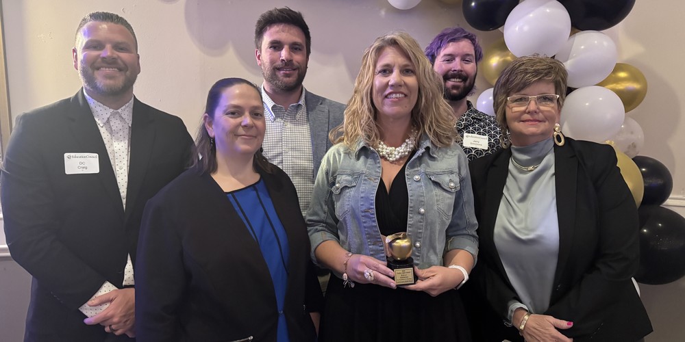 Teacher receiving Golden Apple award