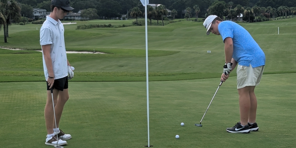 brothers playing golf