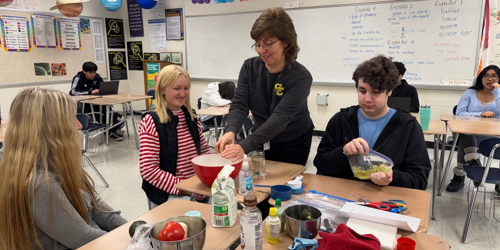Magali McCarty with students