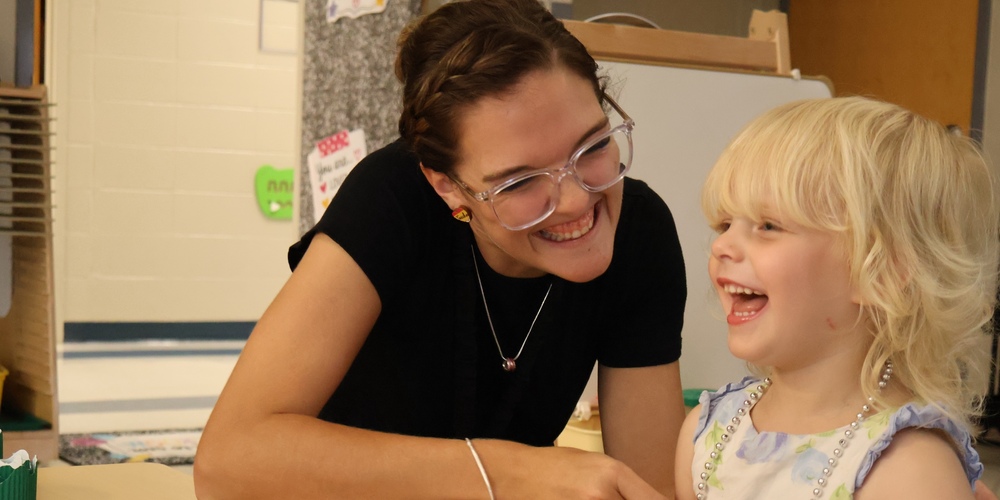 teacher with student