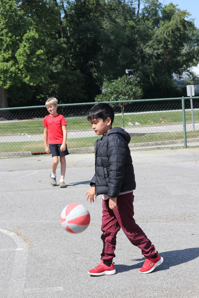 boy playing basketball