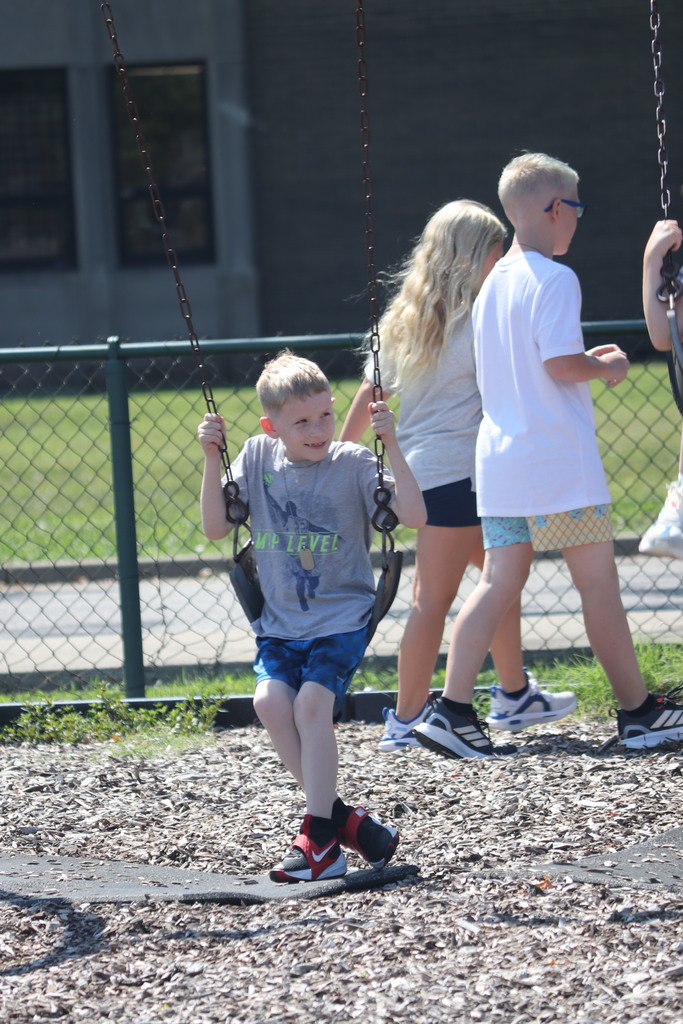 boy on swings
