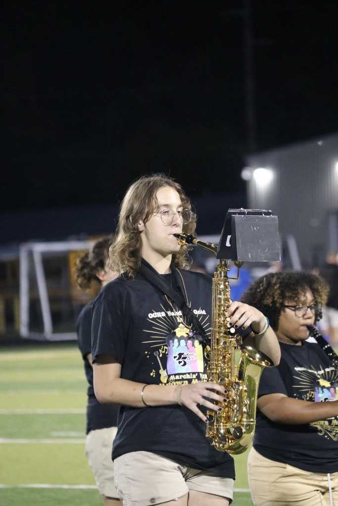 playing saxophone