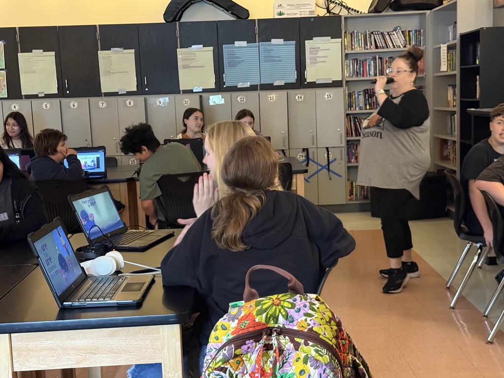 Mrs. Smith rapping for her students.