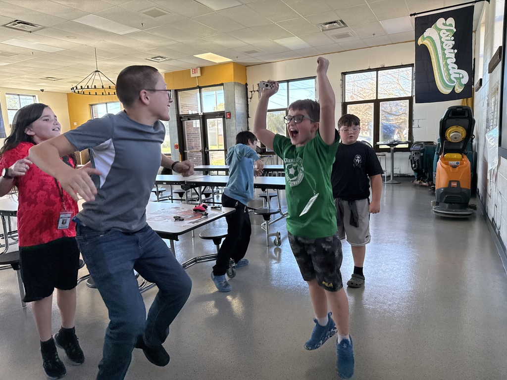 Students compete in a Super Smash Bros. tournoment.