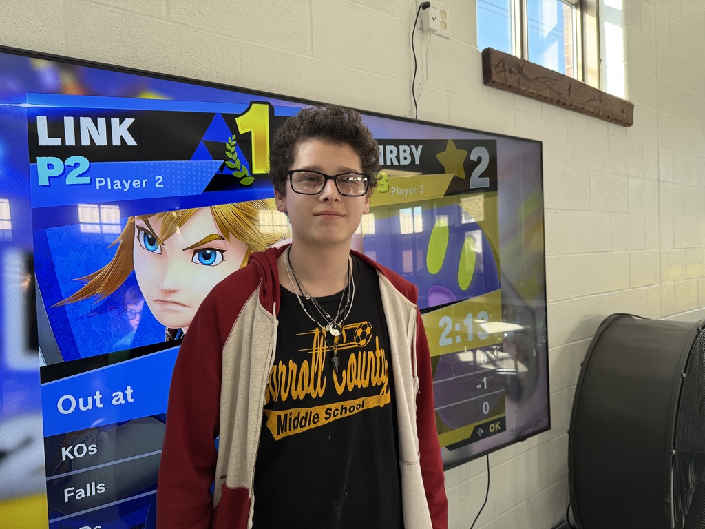 Students compete in a Super Smash Bros. tournoment.