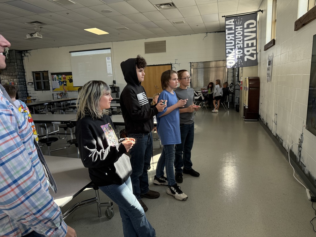 Students compete in a Super Smash Bros. tournoment.