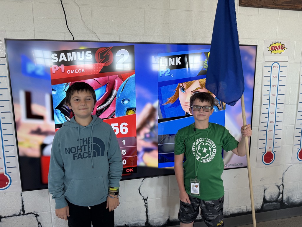 Students compete in a Super Smash Bros. tournoment.