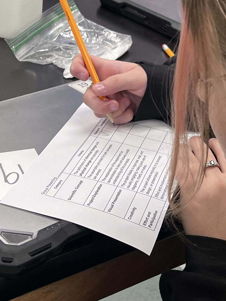 Students study science in Mrs. New's classrooom.