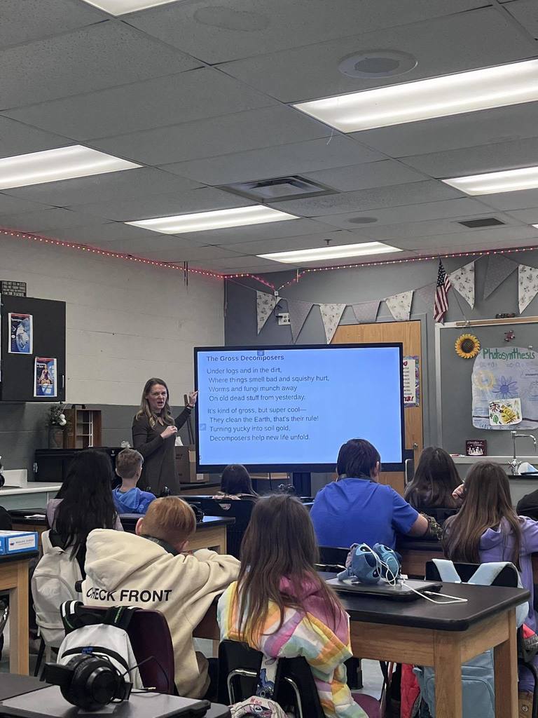 Ms. New using reading strategies with her class. 