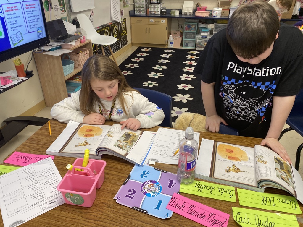 students reading together