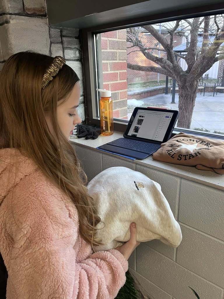 Students completing jobs around the school.