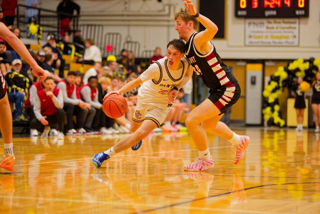 Student playing basketball