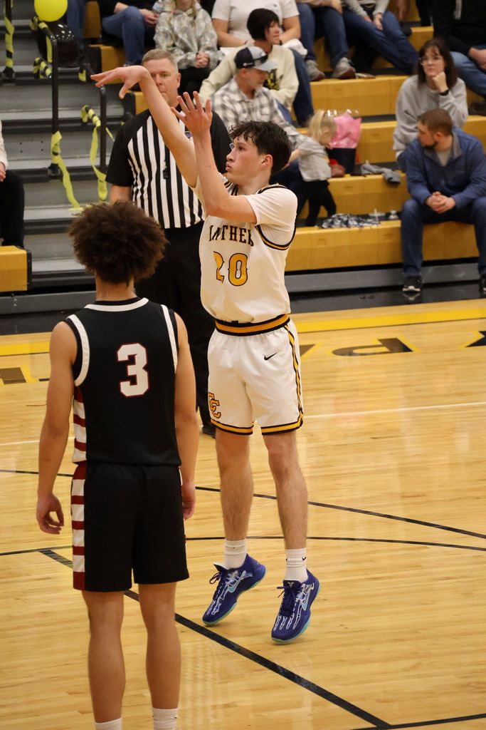 Student playing basketball