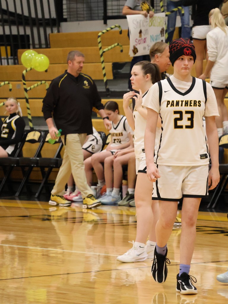 girl playing basketball