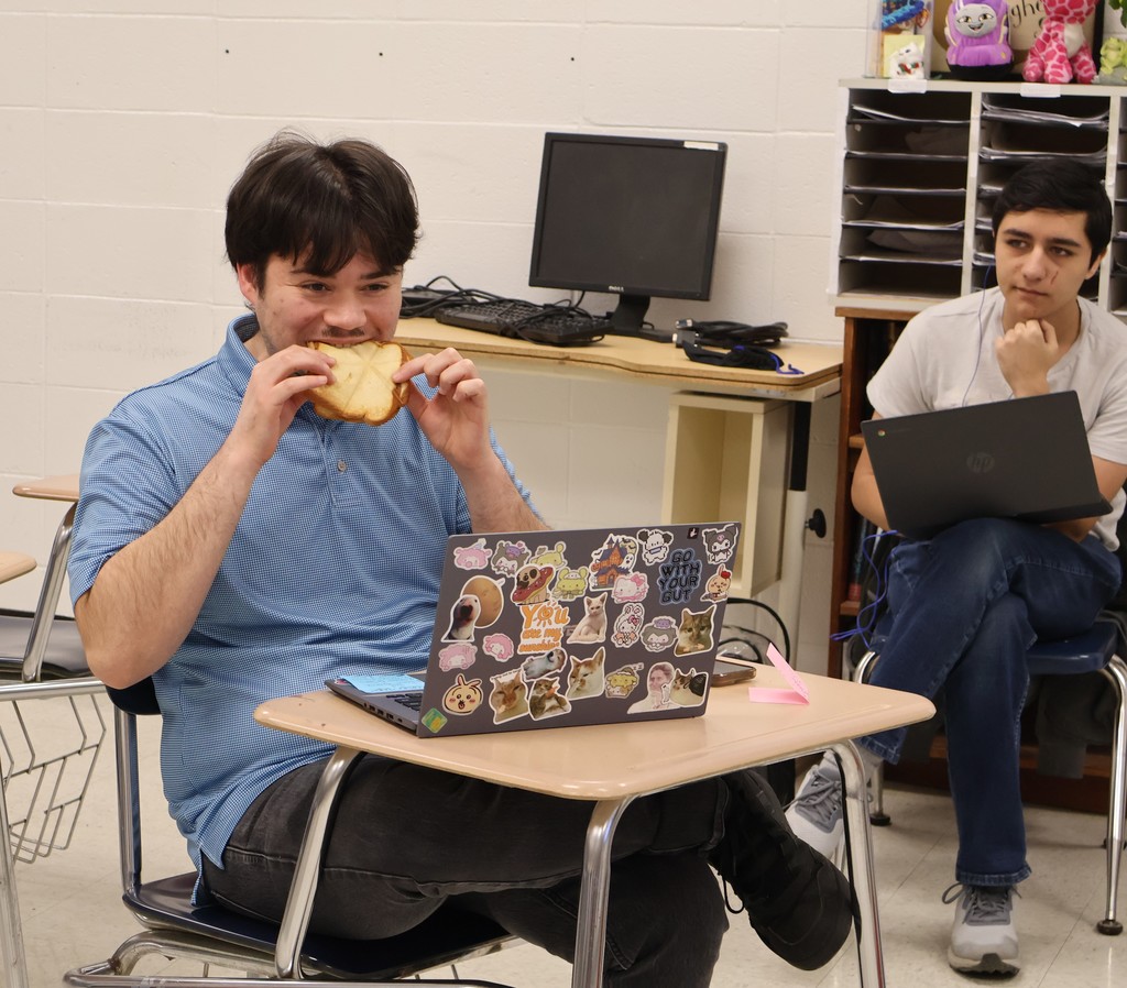 teacher tasting grilled cheese
