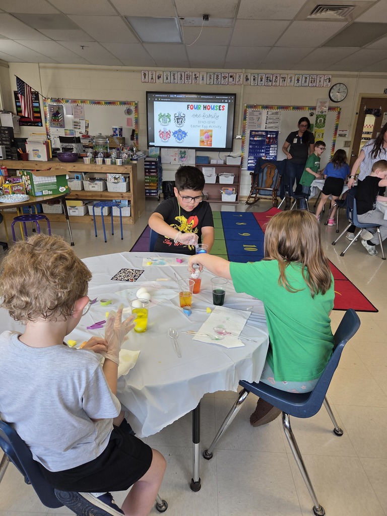 students dyeing easter eggs