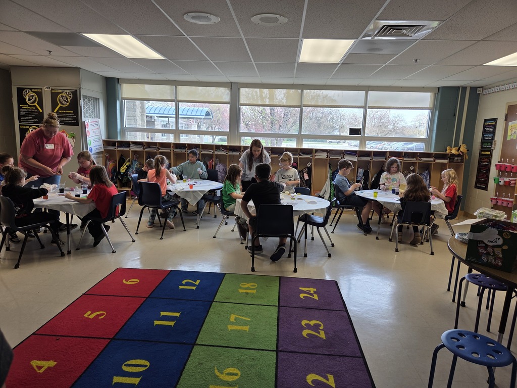 students dyeing easter eggs