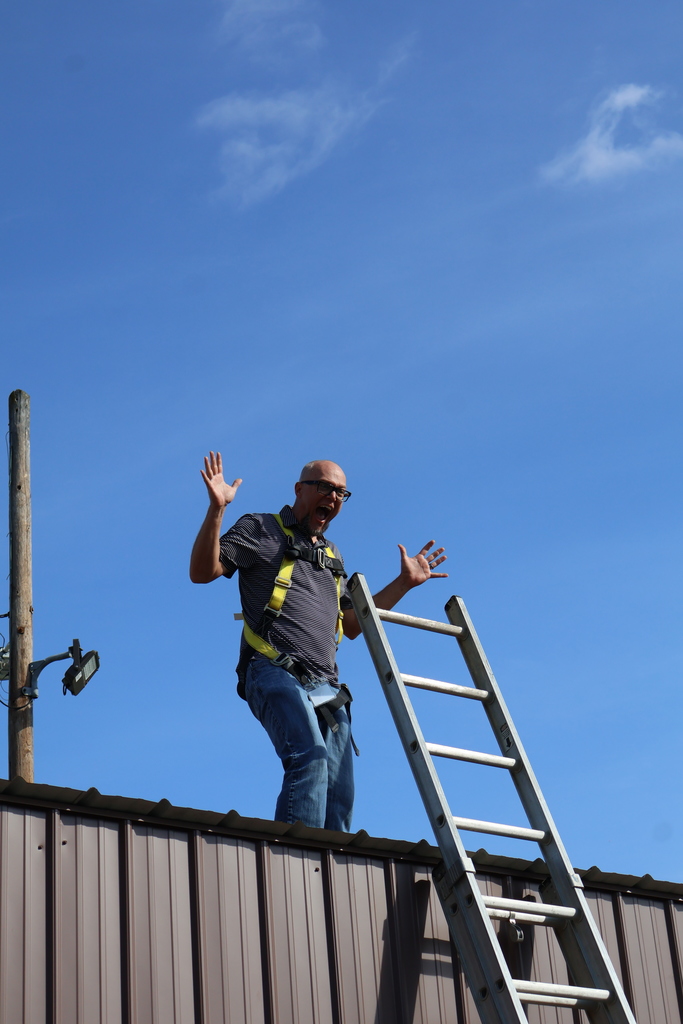 counselor pretending to be stuck on roof