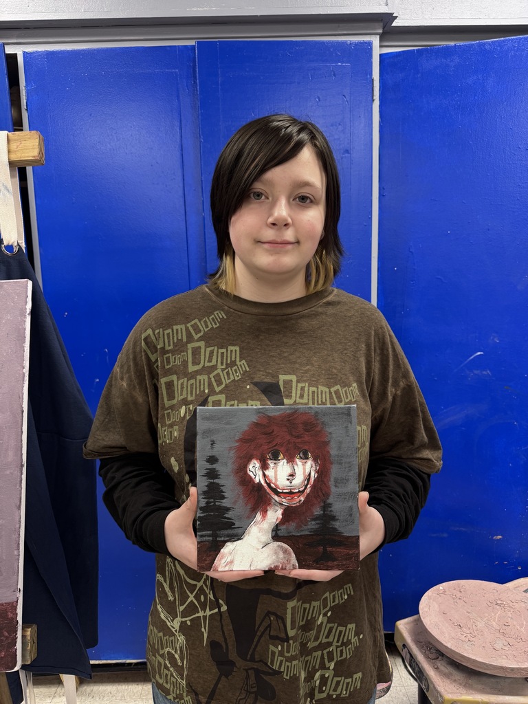student with artwork