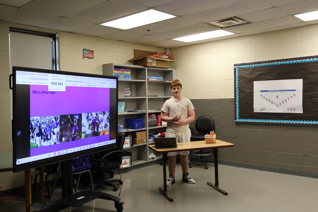 student giving presentation